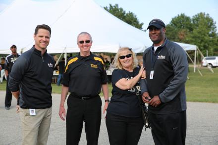 Principal Galiher, Dr. Thacker, Mrs. Thacker and Penn Asst. Principal Derrick White